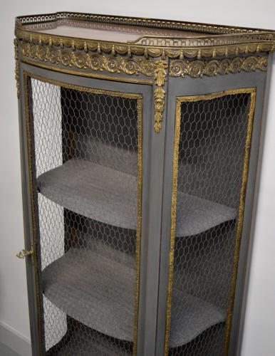 19th Century Louis XVI style wire bow front display cabinet