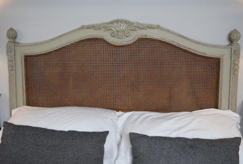 King size Louis XVI style cane bedstead c1900