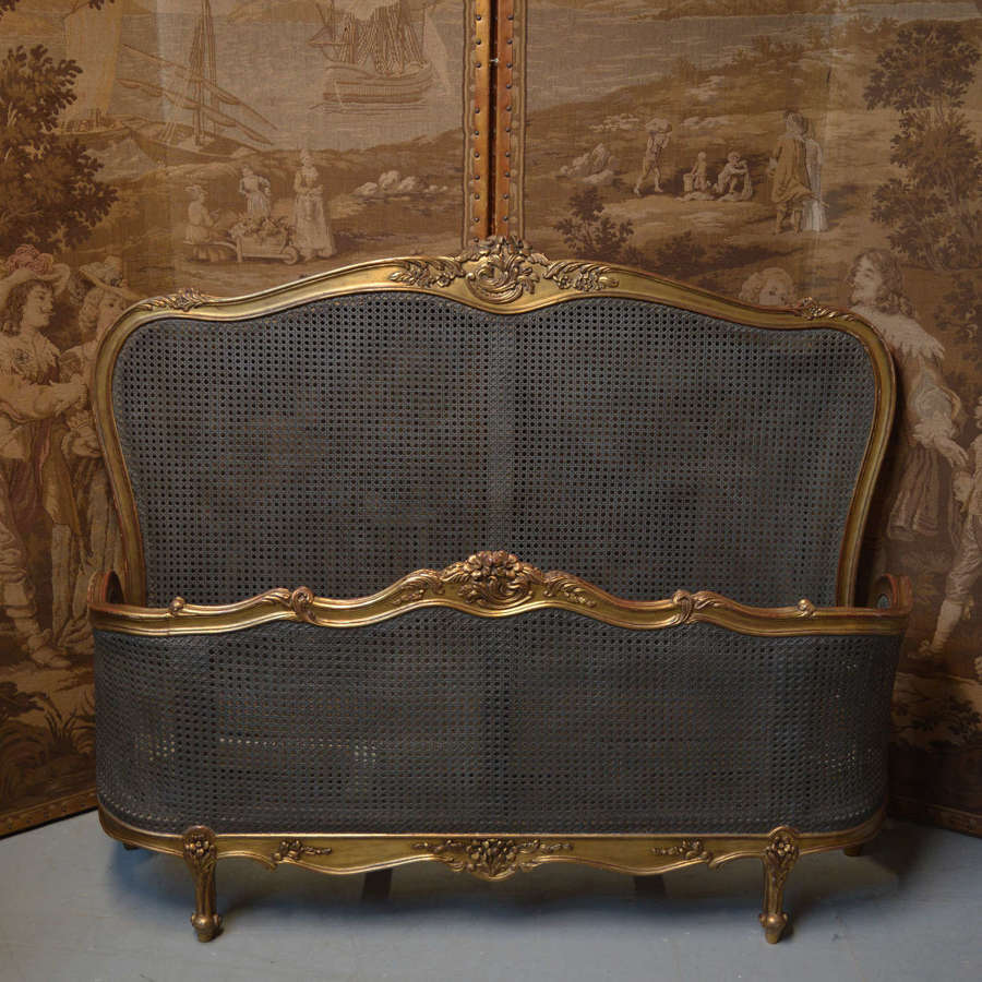 Louis XV style king size giltwood frame cane bedstead