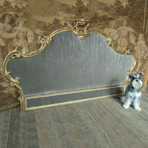 Venetian giltwood upholstered headboard