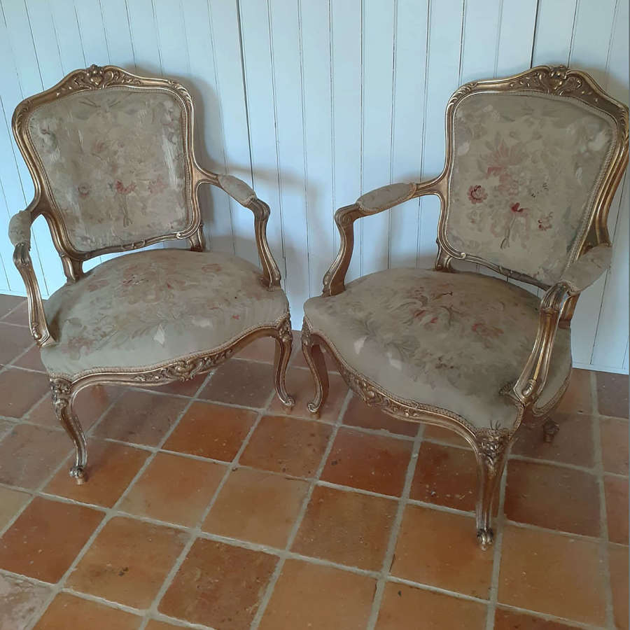Pair of Mid 19th Century Louis XV style giltwood Fauteuils / armchairs